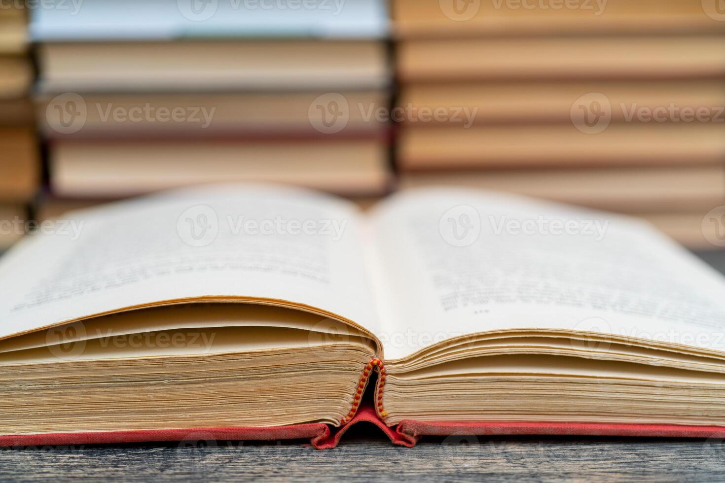 Old book in the red obnozhka. Symbol of knowledge and learning. photo