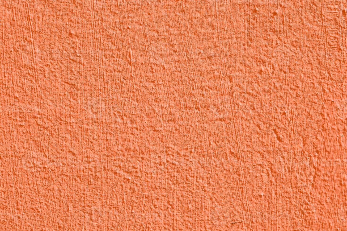 Orange stucco texture. Designer interior background. Abstract architectural surface. photo