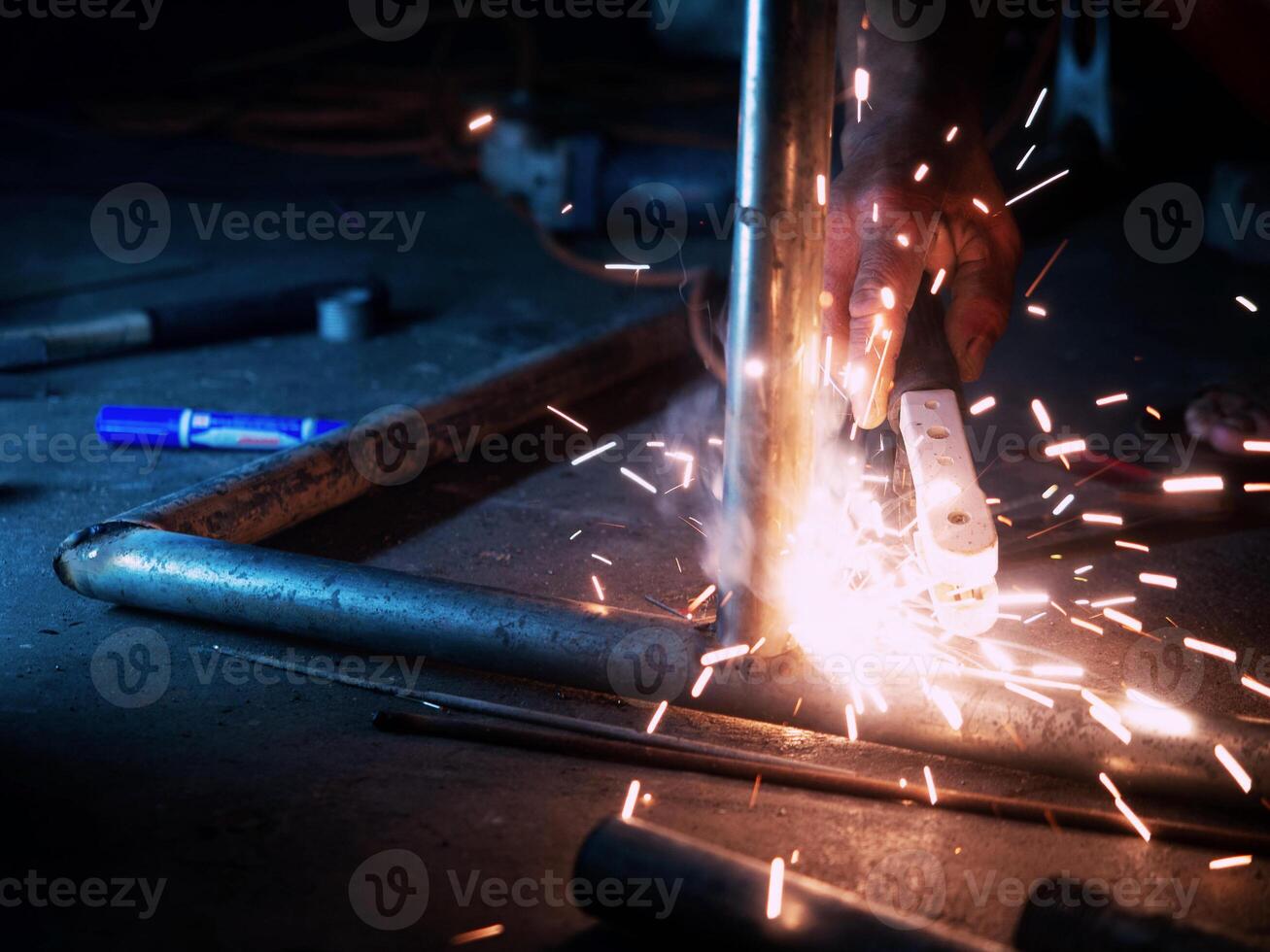welder spark industry factory steel safety manufacturing skill equipment metal work job labor engineer construction glowing light energy effect particle shiny technician burn flash iron fire mask photo