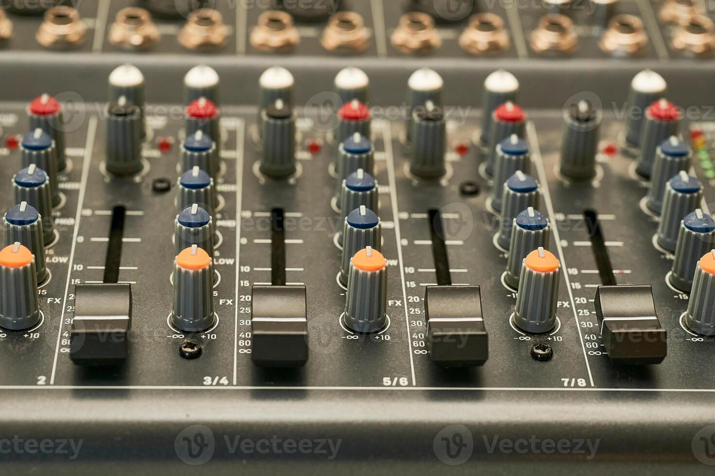 Mixing console for controlling the volume, frequencies of musical instruments photo
