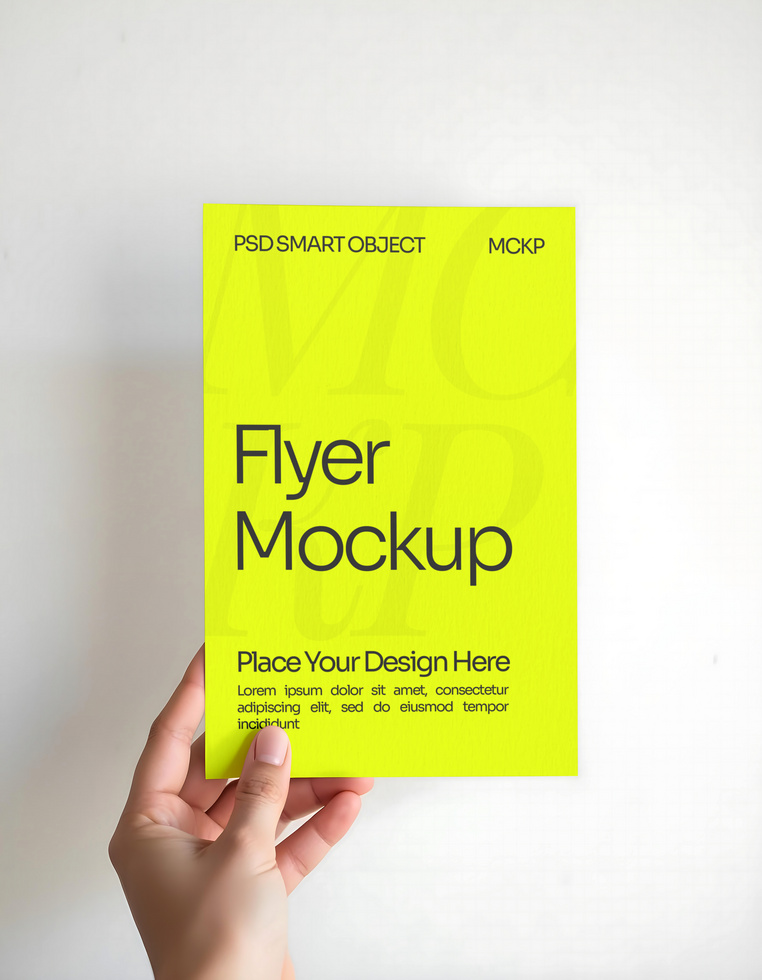 Hand holding a flayer mockup on a simple Background psd