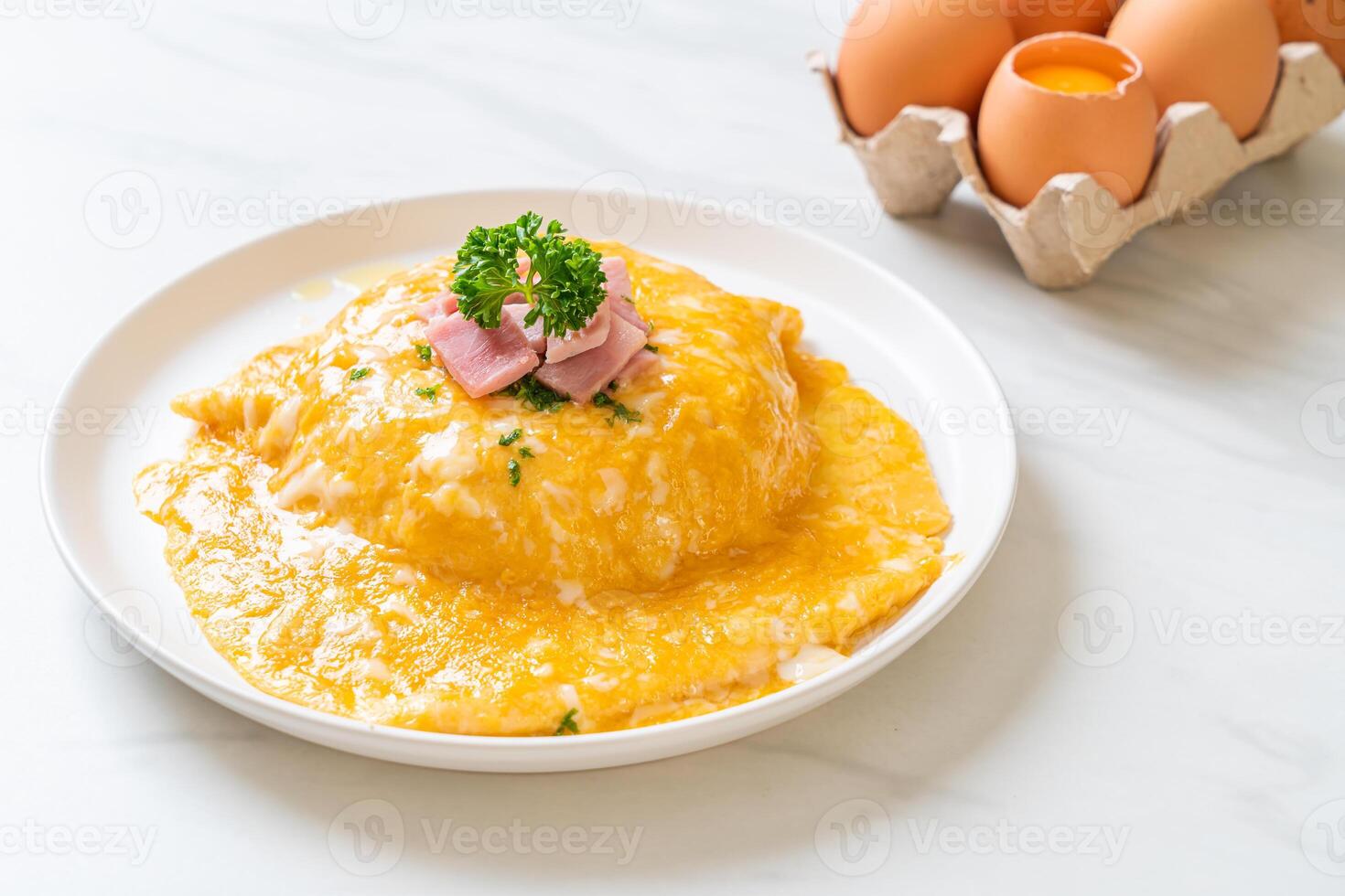 Creamy Omelet with Ham on Rice photo