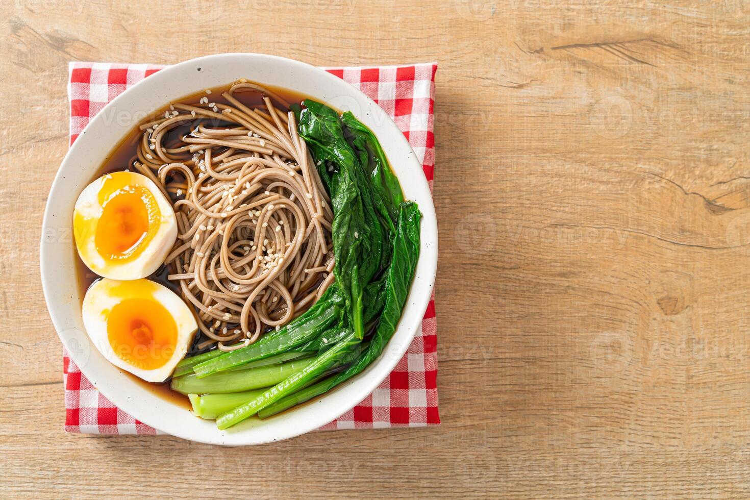 ramen noodles with egg - vegan or vegetarian food style photo