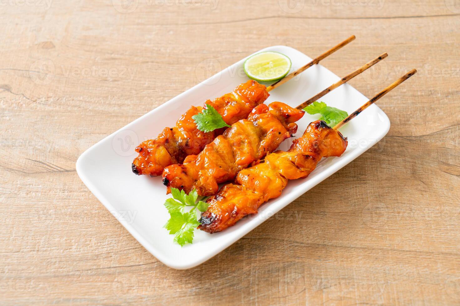 grilled chicken skewer with herbs and spices photo