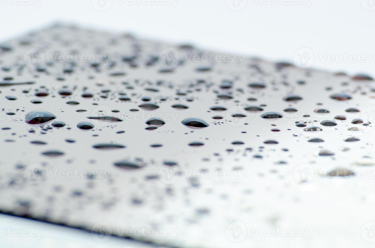 Clear water droplets on dark cover background. Water droplets concept. photo