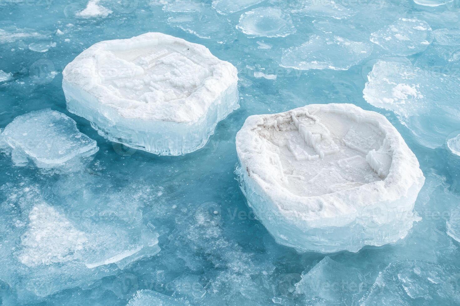 Icy frozen lake with floating ice blocks photo