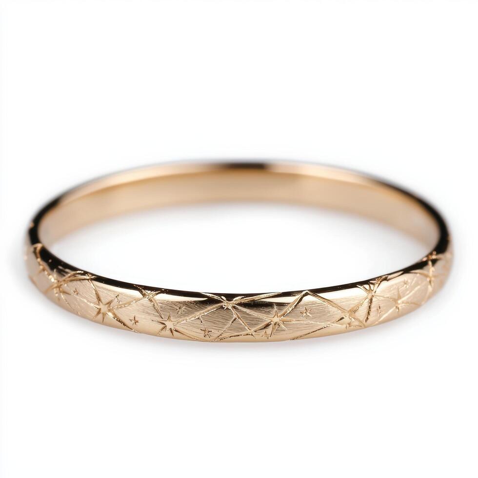 Elegant gold bangle bracelet with intricate star pattern photo