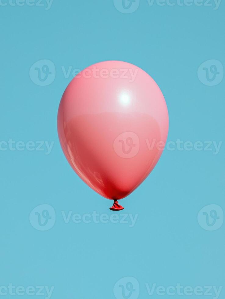 floating pink balloon on blue background photo