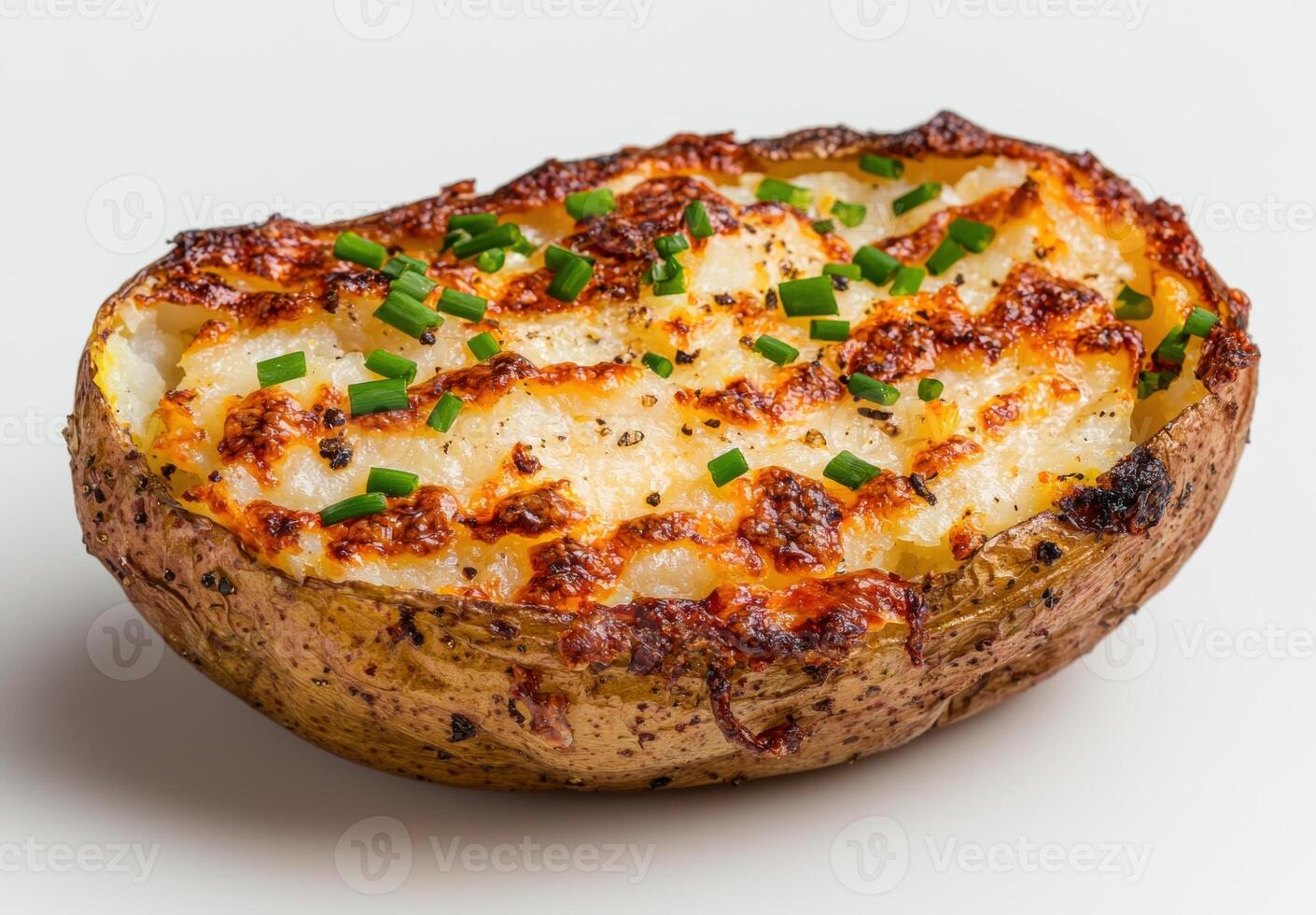 Baked potato with cheese and green onions photo