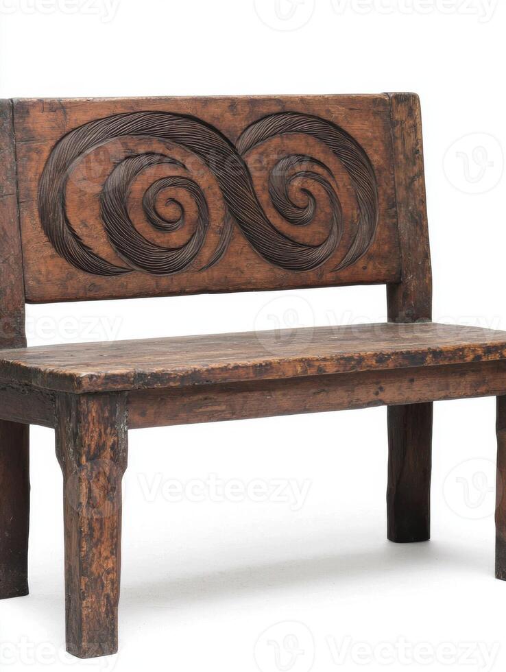 Rustic wooden bench with carved spiral design photo
