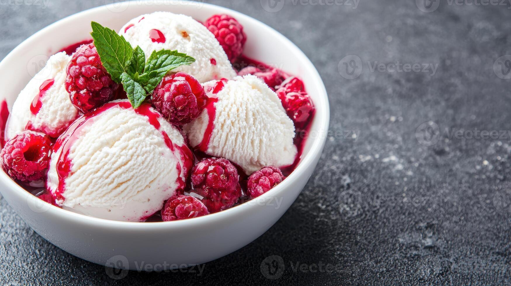 delicious raspberry ice cream dessert with fresh raspberries photo