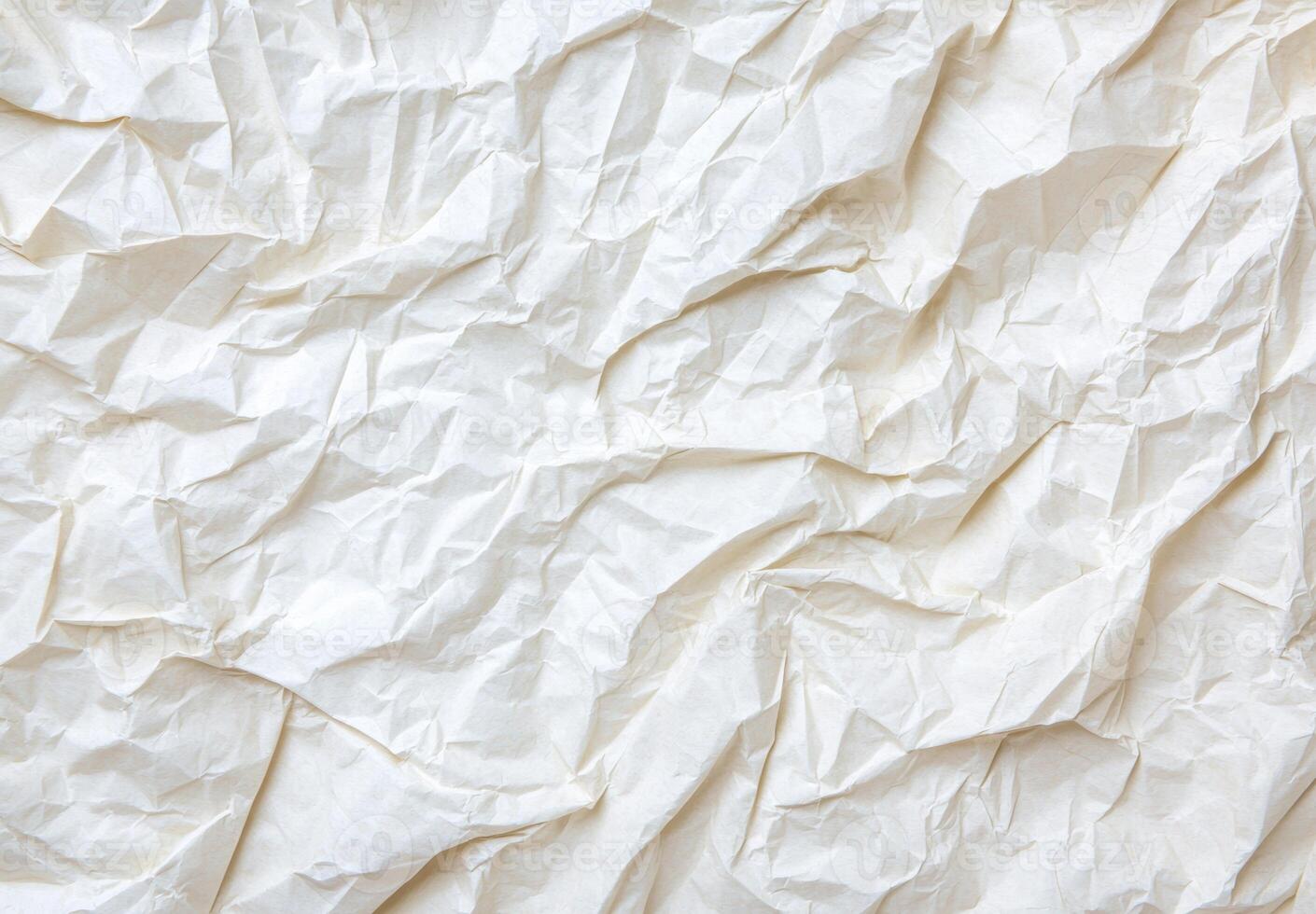 Crumpled white paper texture background photo