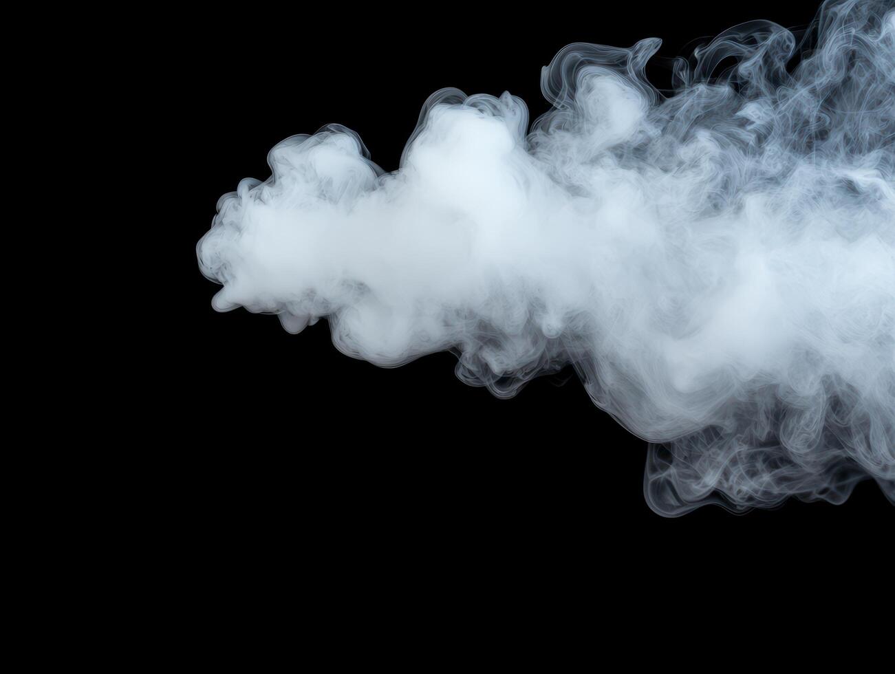 Wispy cloud of white smoke against a dark background photo