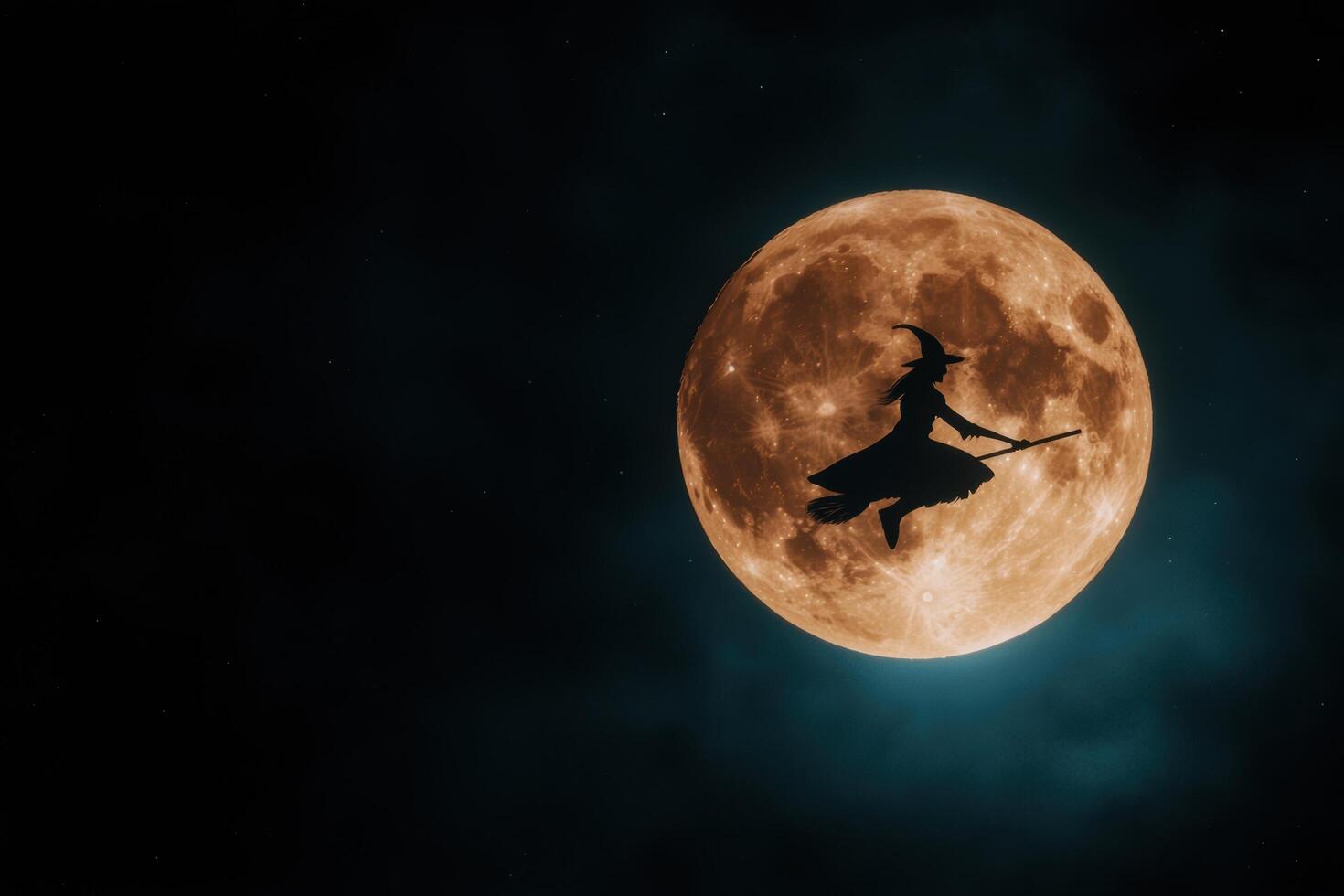 Silhouette of a witch flying on a broomstick against a full moon photo
