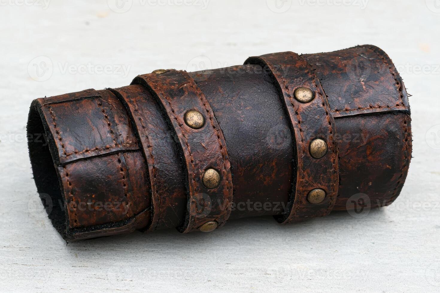 Vintage leather bracelet with metal studs photo