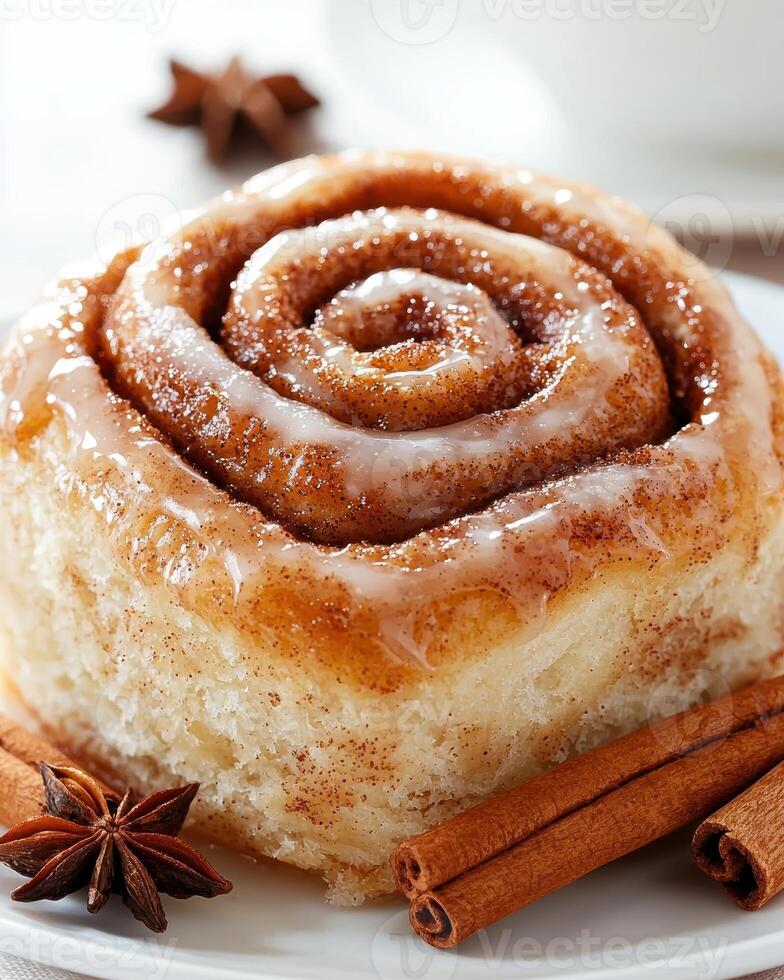 Delicious cinnamon roll with glaze photo