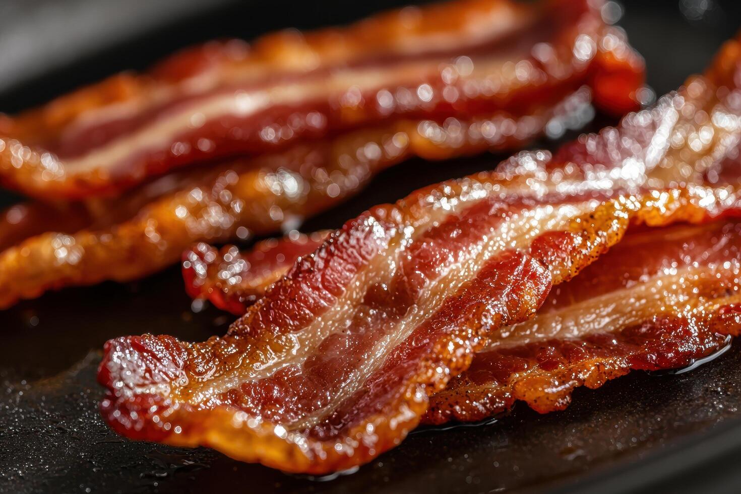 Bacon is a popular food that is often served with eggs photo