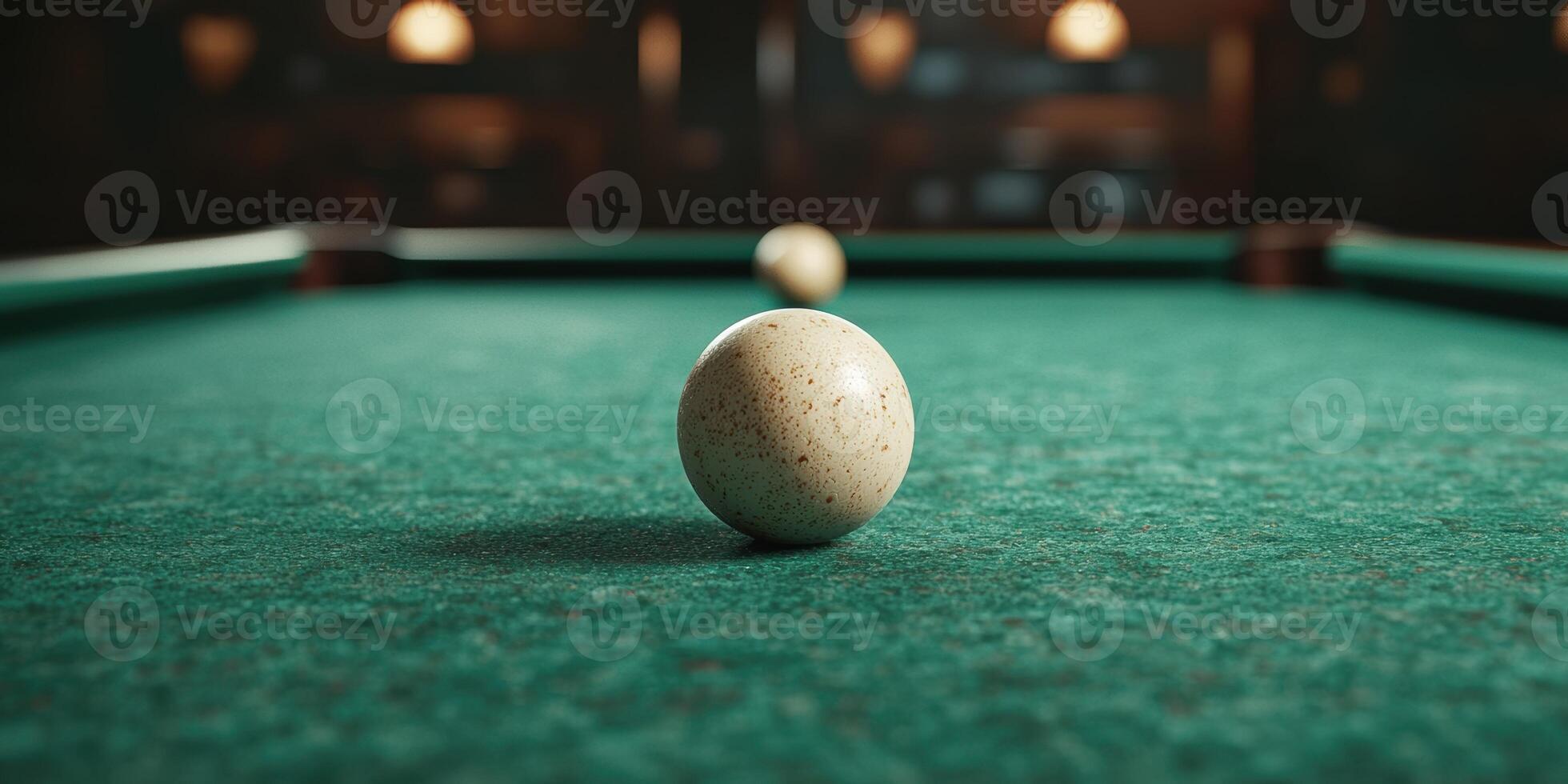 A billiard ball on a pool table photo