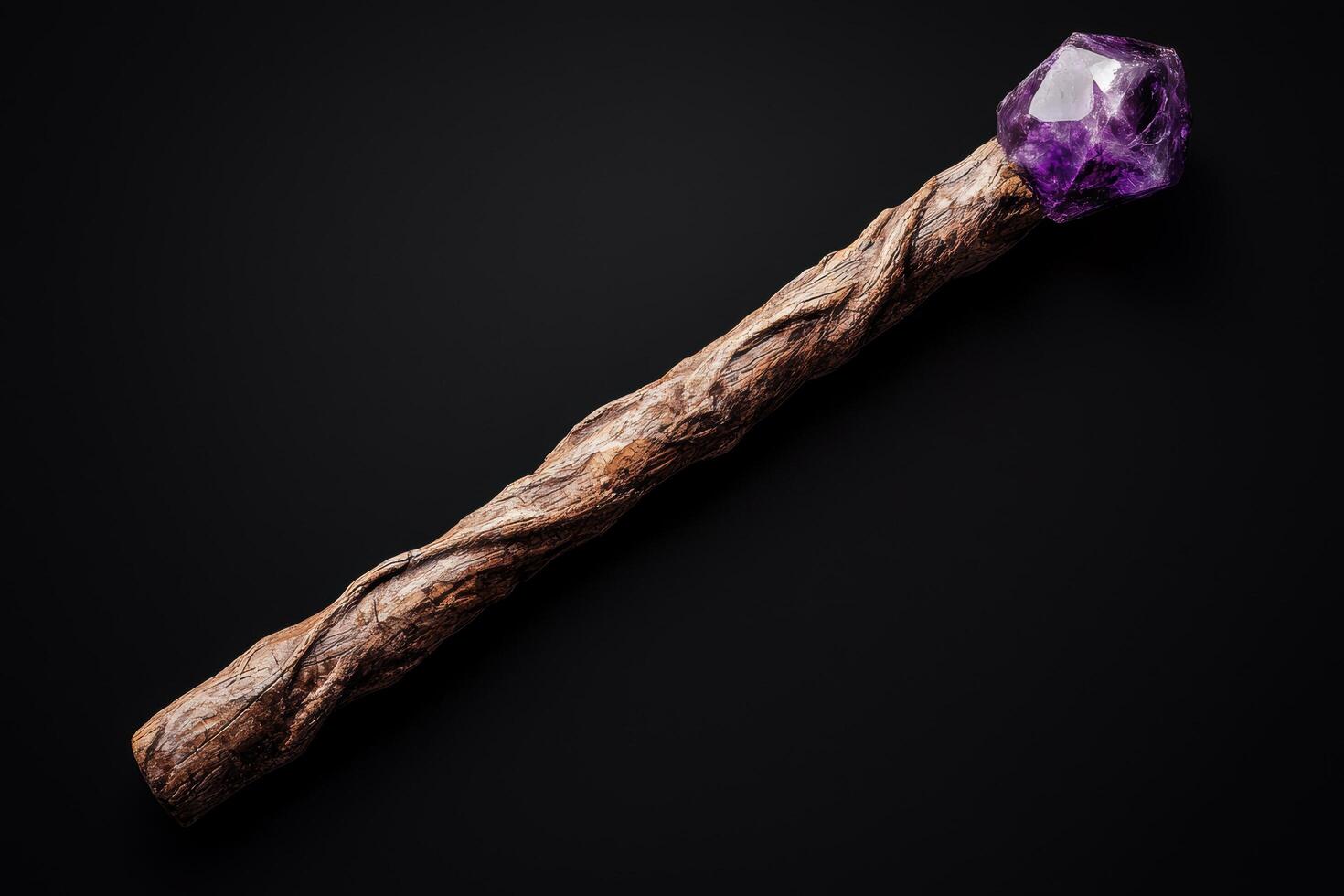 Amethyst crystal on wooden branch photo