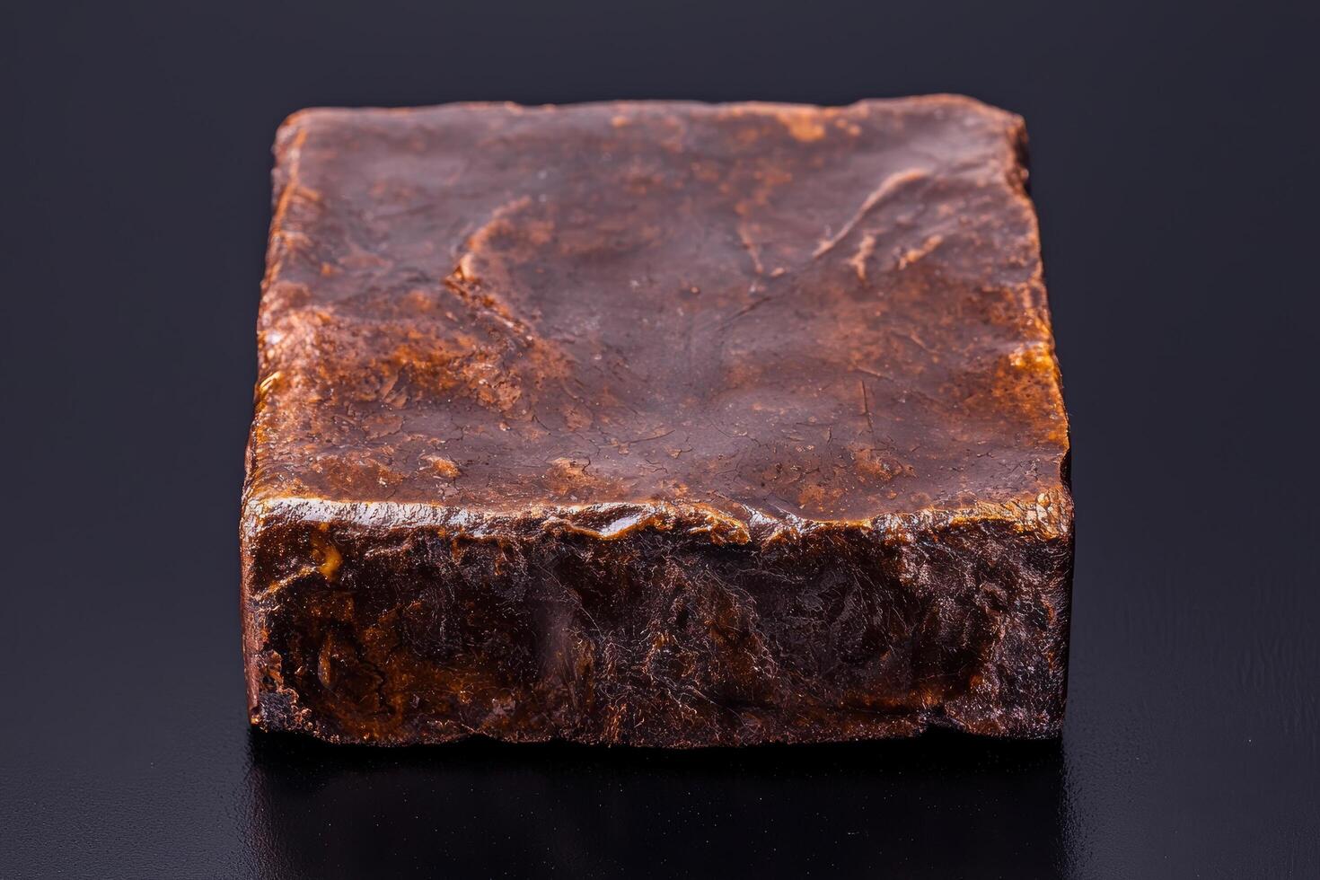 Closeup of a dark, rough rock formation photo