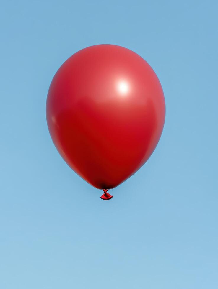 Floating red balloon in blue sky photo