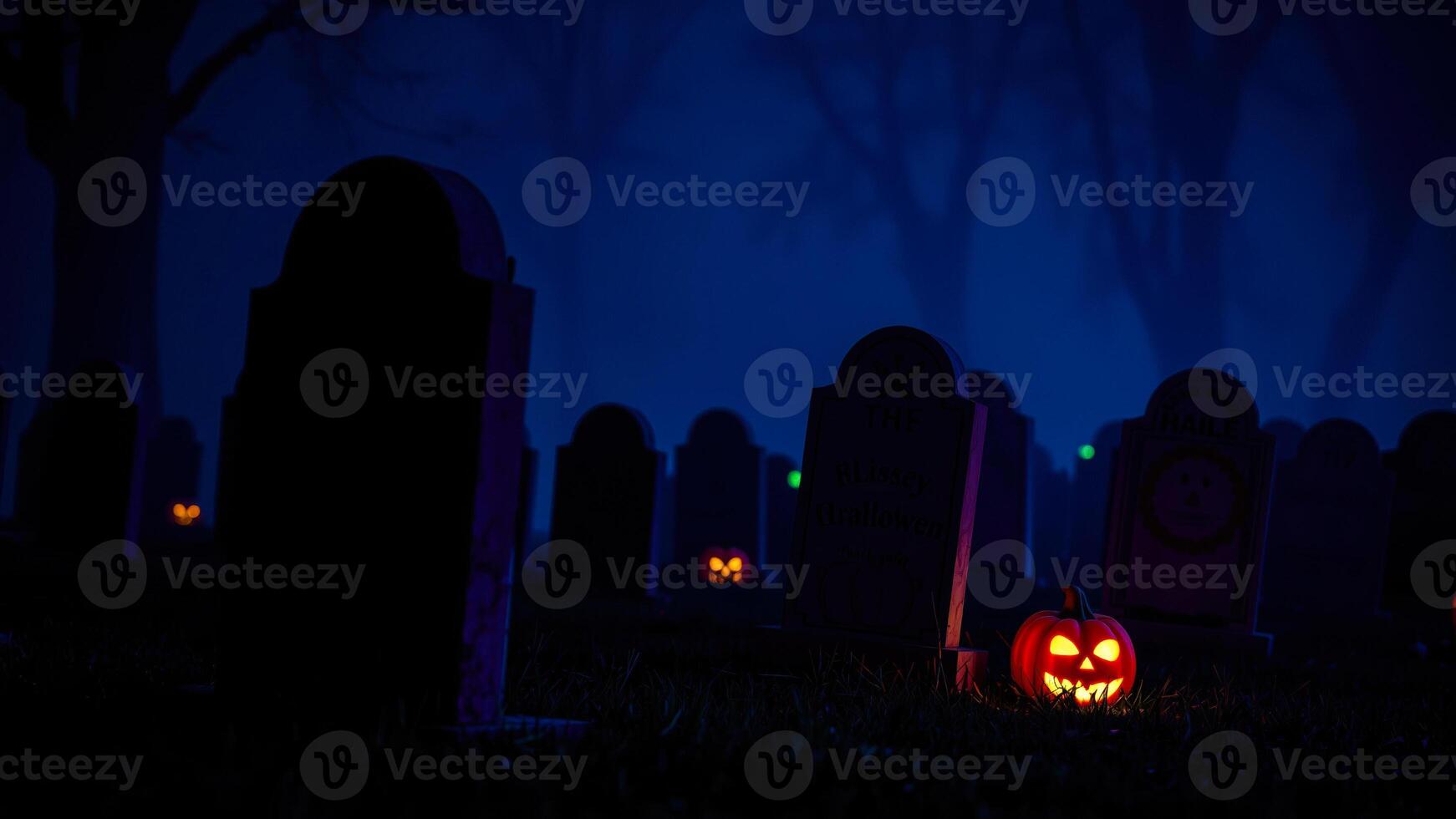 glowing jack-o'-lantern sits before a tombstone a foggy graveyard photo
