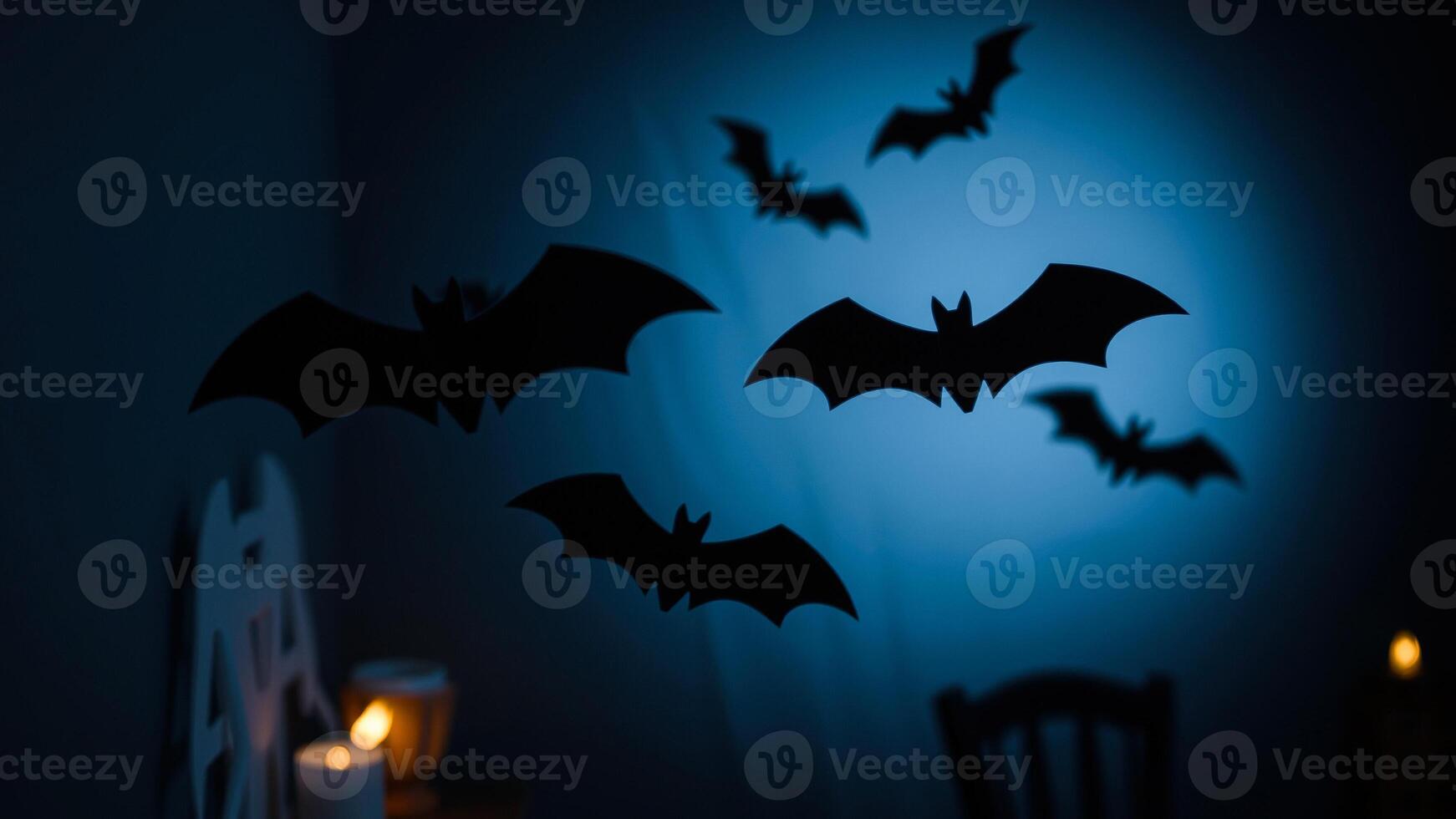 dark background decorated with paper bats halloween photo