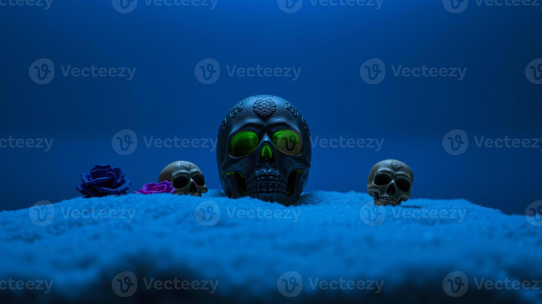 three glowing skulls on a blue surface photo