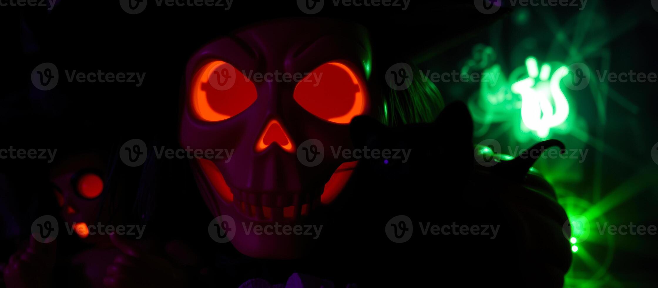 glowing skull with a green light the distance photo
