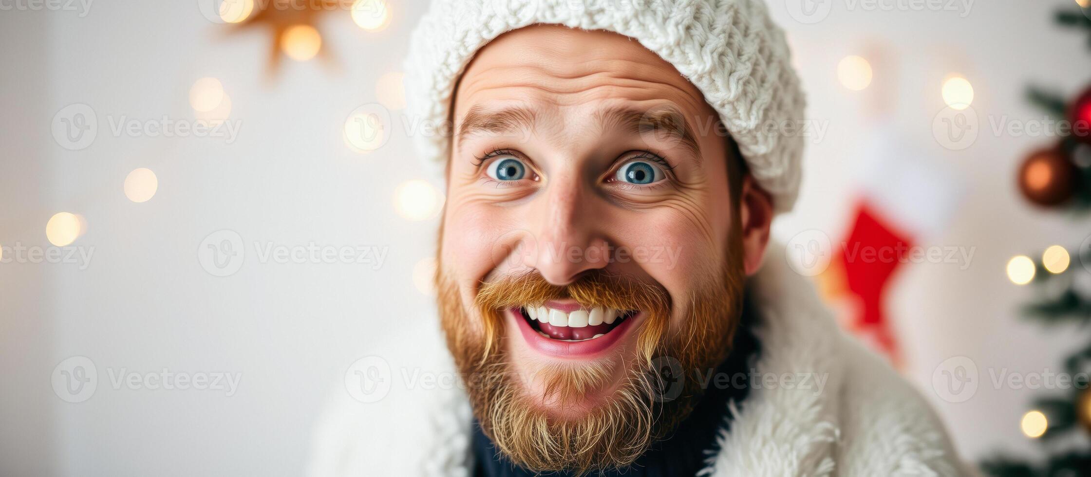 man with a wide grin bright blue eyes enjoys the festive holiday season photo