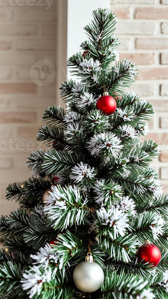 close- a decorated evergreen tree with red white ornaments photo