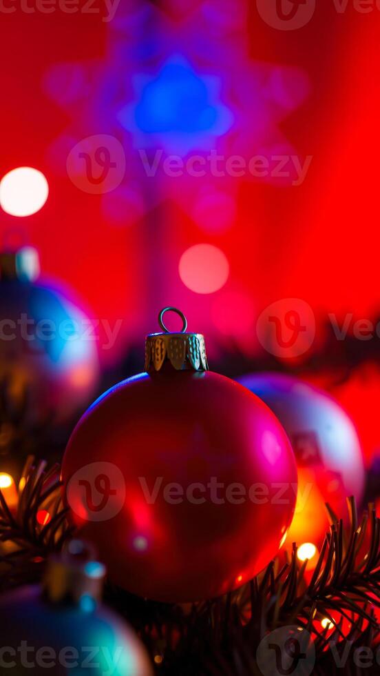 red christmas ornament hanging on a tree photo