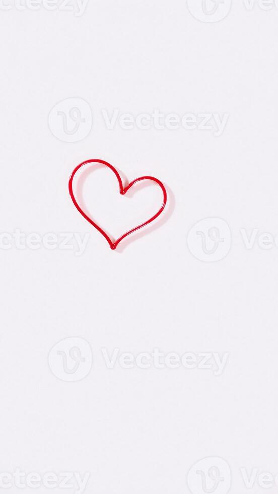 red heart shape against a white background photo