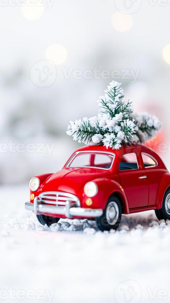 red toy car with a snowy pine tree on top photo