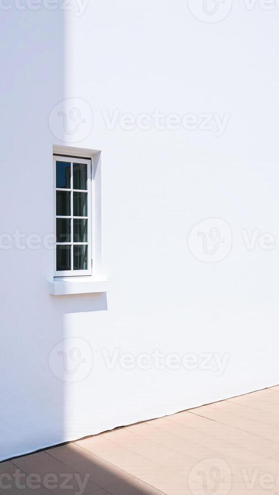 single window on a white wall photo