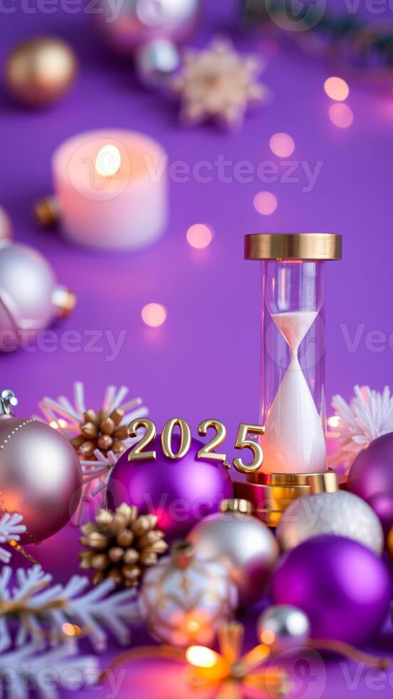 golden hourglass festive ornaments on a purple background photo