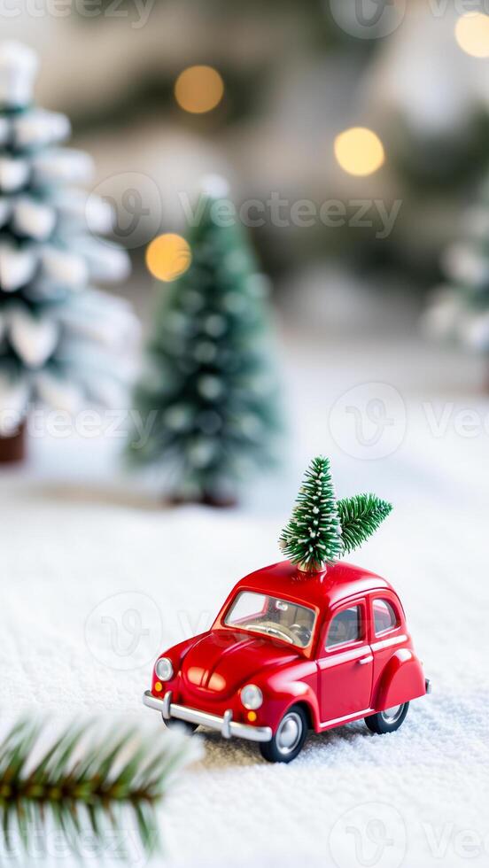 miniature red car carrying a tiny evergreen tree a snowy setting photo