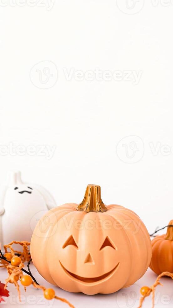 smiling pumpkin with white ghost pumpkin decor photo