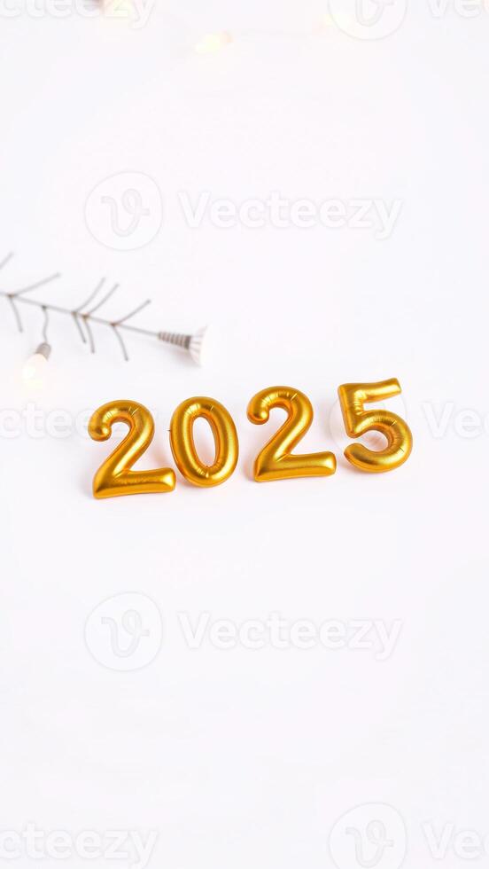 golden inflatable numbers representing 2025 photo