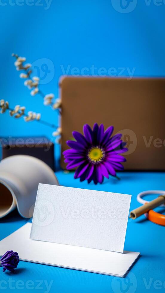 white card with purple flower on a blue background photo