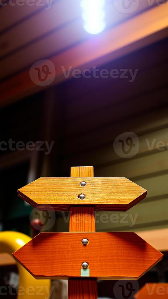 wooden signpost with two arrows photo