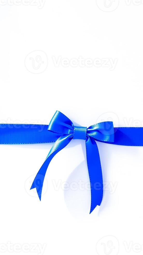 single blue satin ribbon bow photo