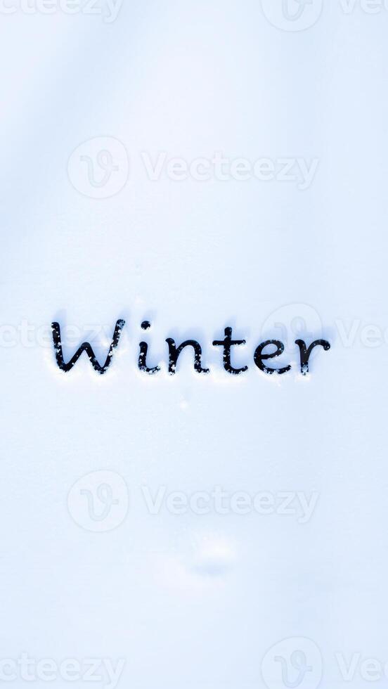 word winter written snow photo