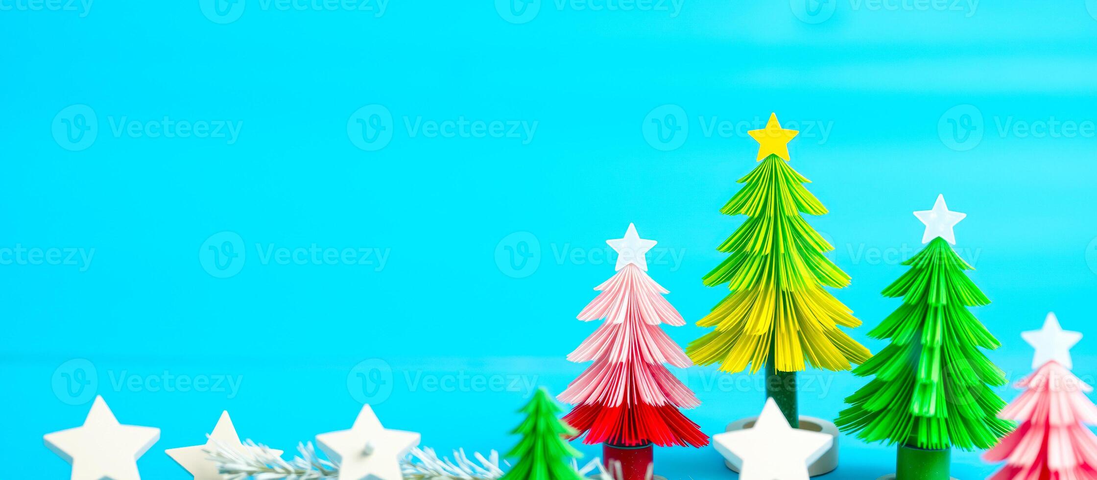 paper trees on a blue background photo