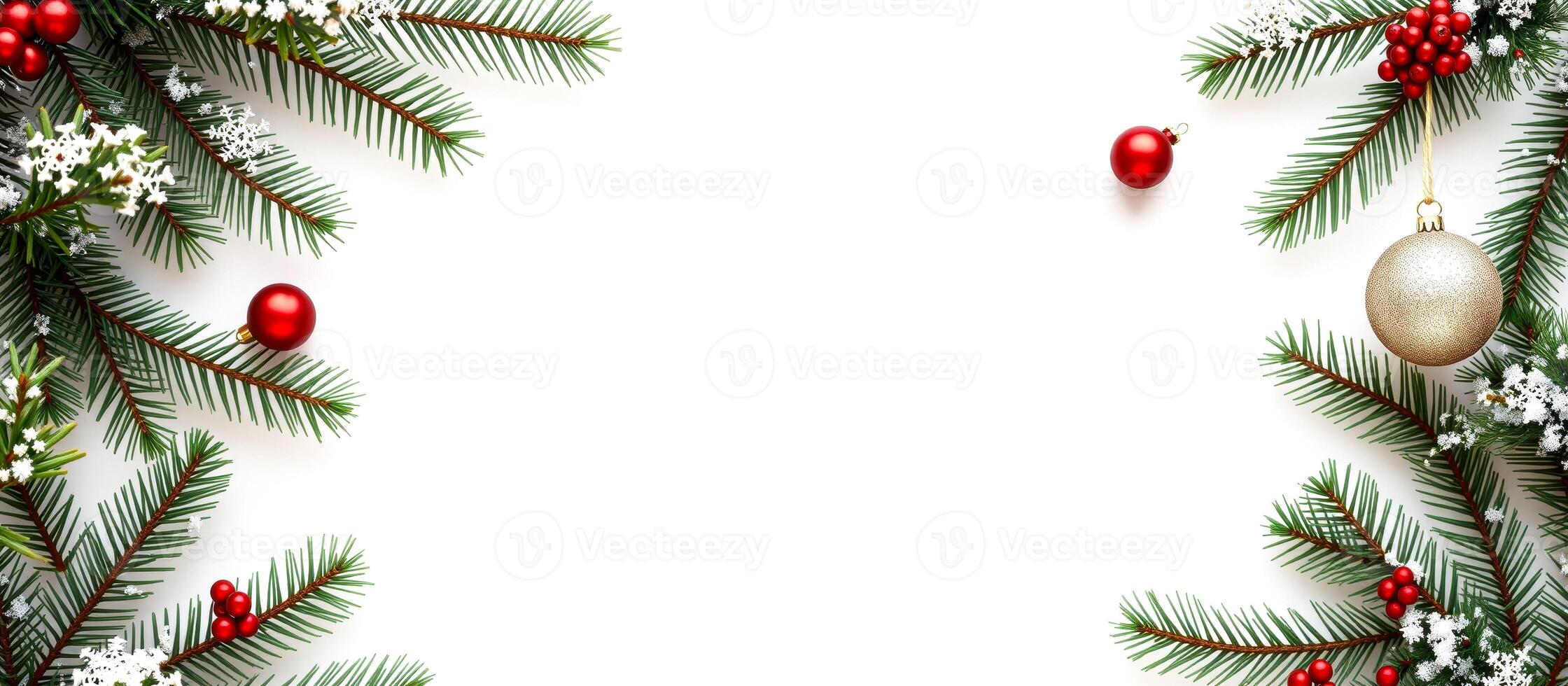 festive evergreen branches with red ornaments a gold bauble create a border against white photo