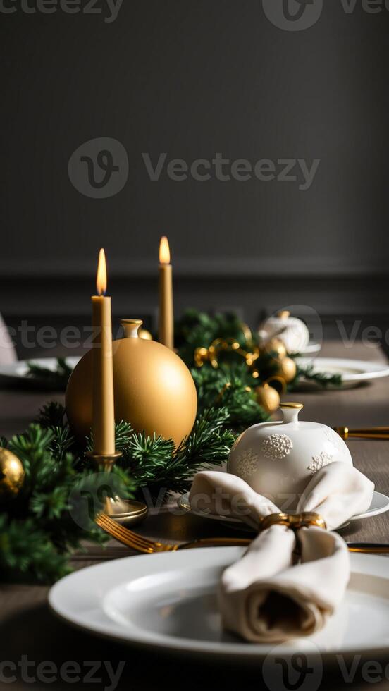 festive table setting with evergreen gold accents photo