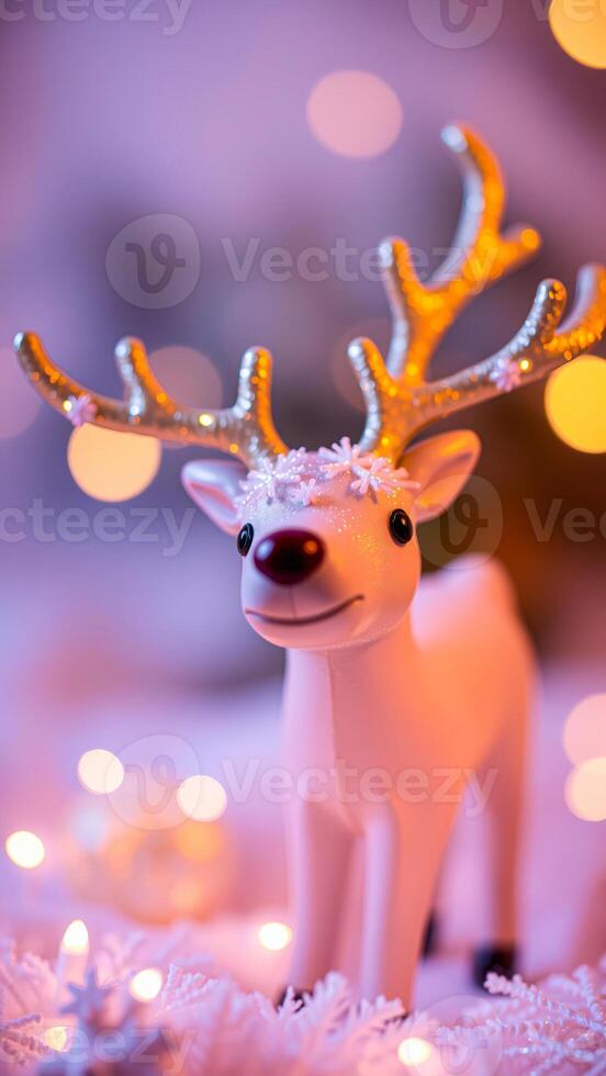 white ceramic reindeer figurine decorated with glitter snowflakes photo