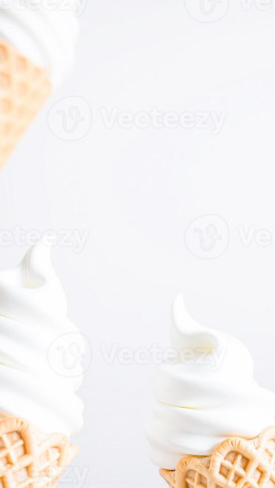 three soft serve ice cream cones on a white background photo