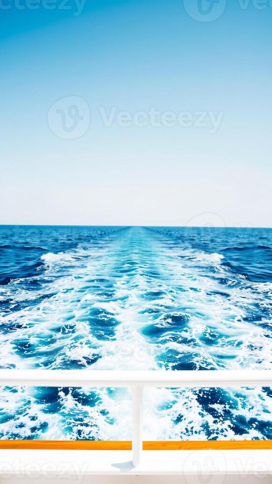 white foamy wake from a boat sailing on the ocean photo