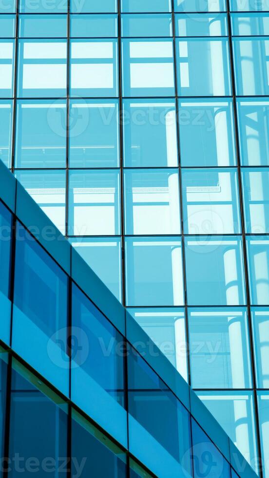 modern glass building with a grid photo